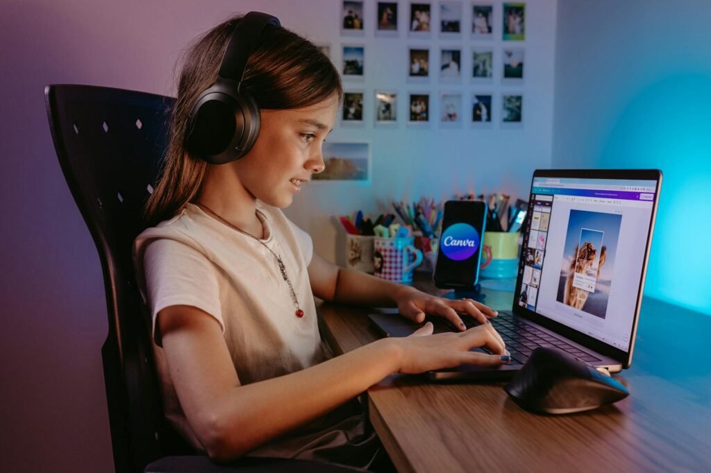 smiling girl using canva website